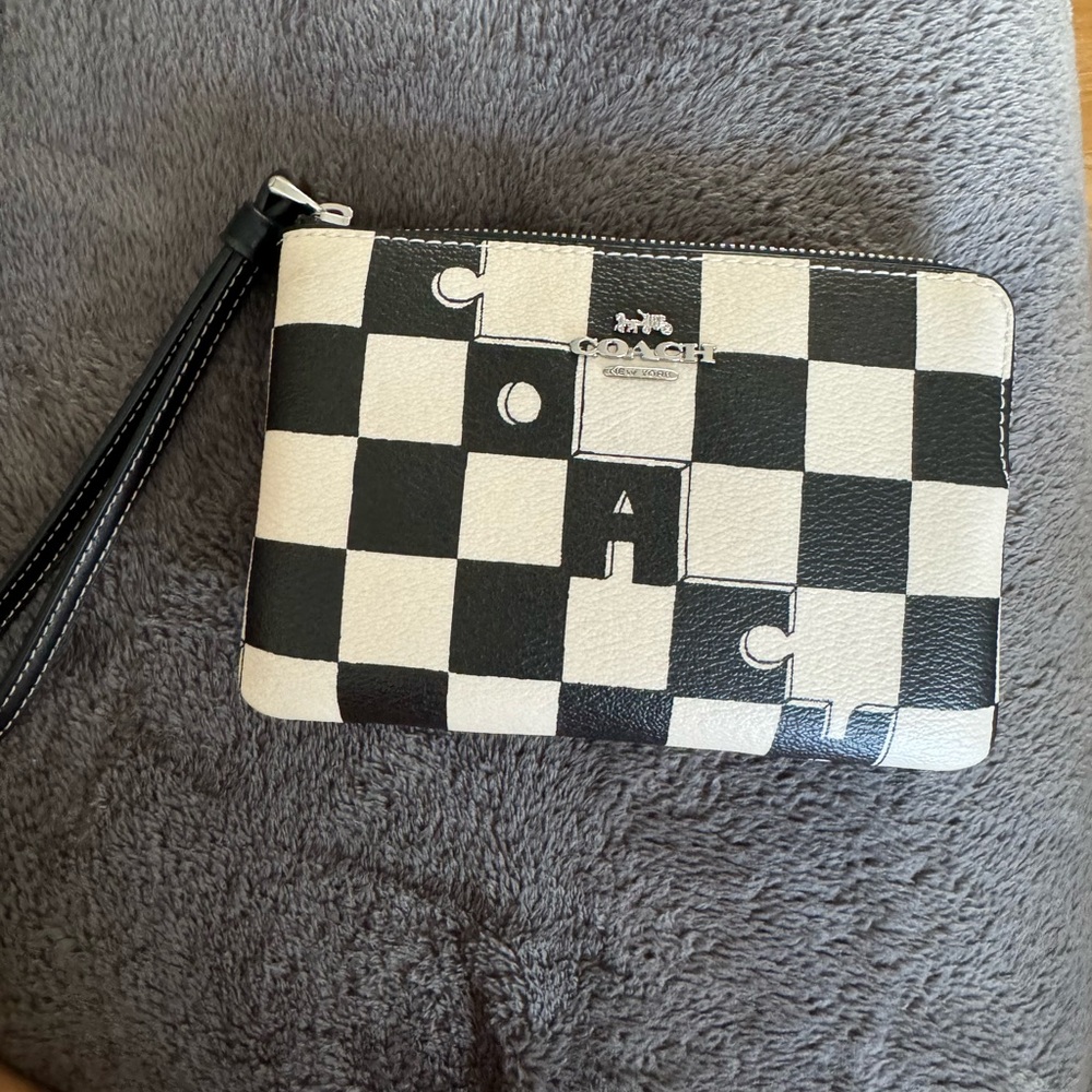Authentic Coach checkered wristlet lightly used condition